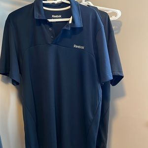Two men’s Reebok golf shirts size L